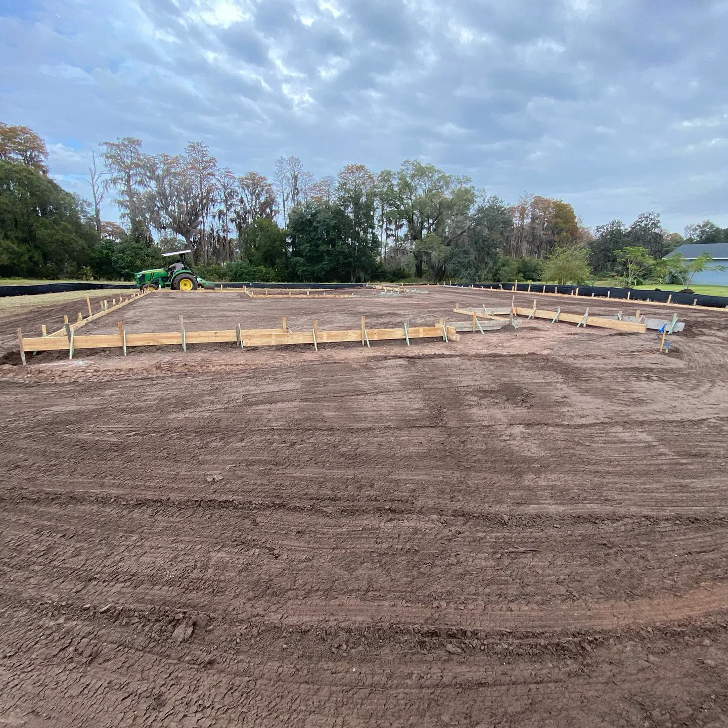 Large graded building pad with form boards set and ready